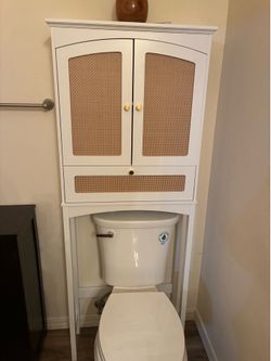 Spirich over the toilet storage shelf