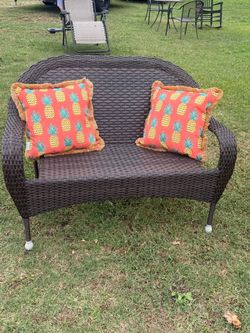 Outdoor Dark Brown Wicker Loveseat Bench with Hampton Bay Pillows