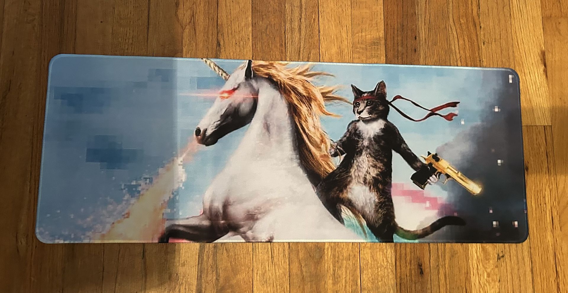 Large computer/mouse pad with cat and unicorn design