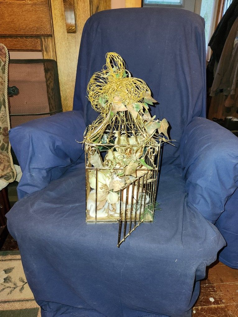 Birdcage With Magnolia Flowers