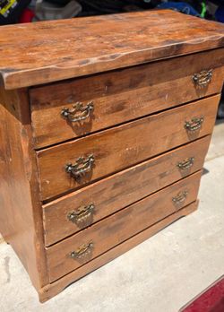 Vintage solid wood dresser. Used but solid condition.