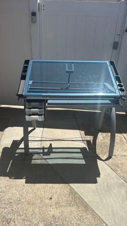Desk , with glass , can be angle .