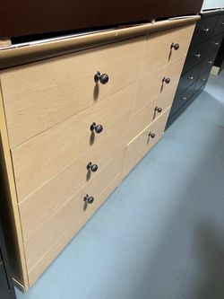 Wide Light Wood Dresser with Chrome Knobs