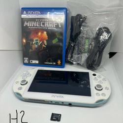 Ps vita 2000 light blue w/game & charger & memory card