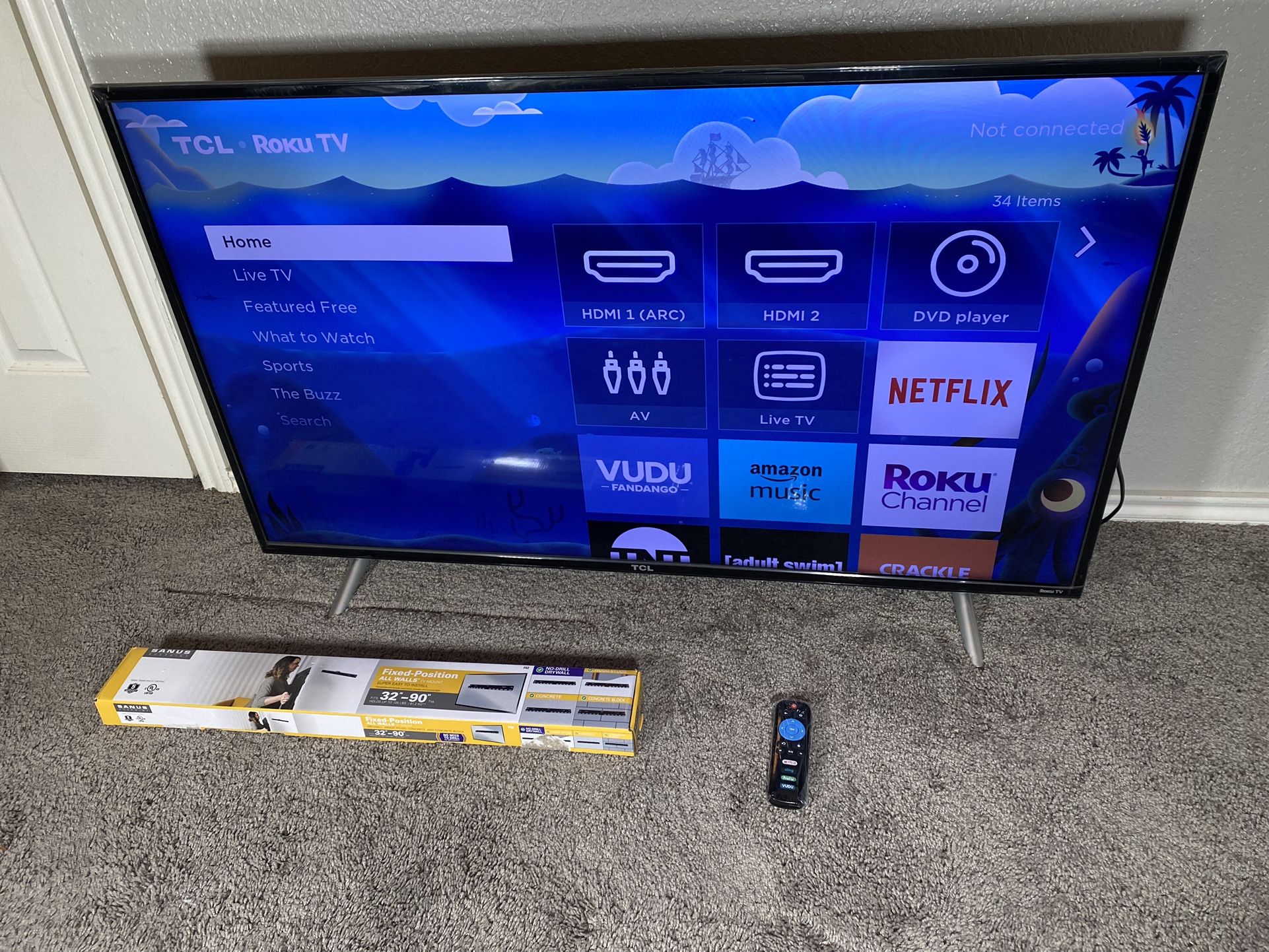 TCL 49” CLASS 4-SERIES 4K UHD HDR ROKU SMART TV  WITH WALL MOUNT