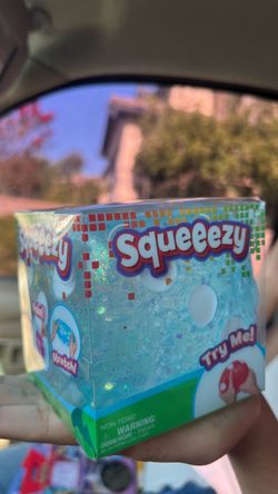 Squeeezy Blue Glitter Dice