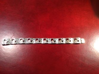 STERLING AND GOLD LINK BRACELET ROOF TOPS ARE 10K GOLD SLIDE BOX CATCH