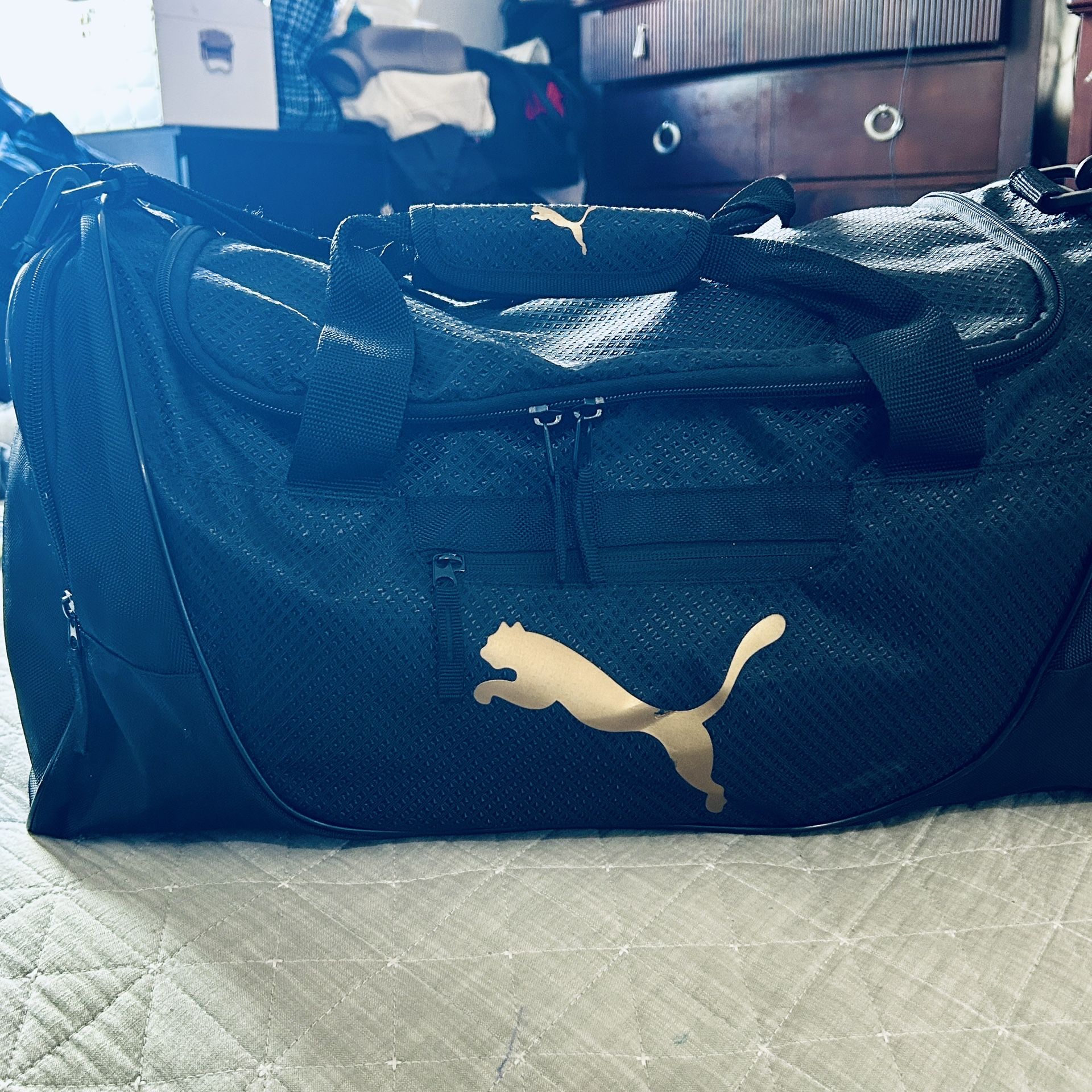 PUMA Black Duffel bag With shoulder Straps And Two Handles