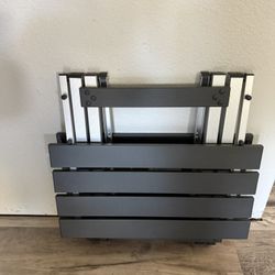 Adjustable height-Foldable camp table 