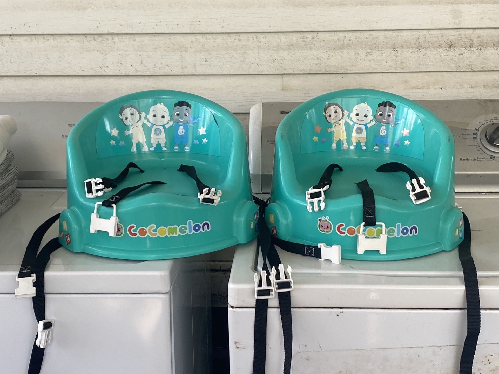 Two Children’s Plastic Booster Seats With Fastenes