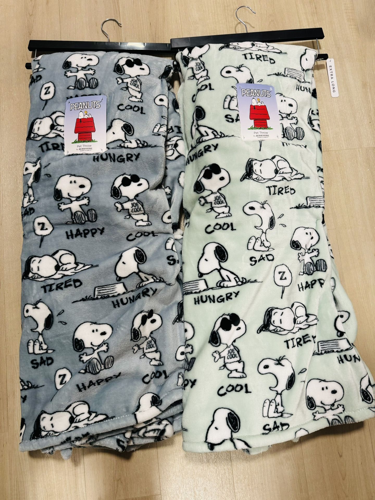 2 Peanuts Snoopy throws