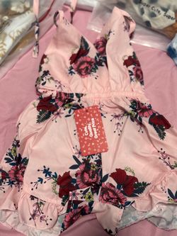 Girls Pink Floral Romper with Ruffle Hem