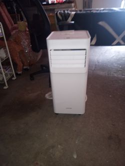 At AC With A Remote Control In Good Condition