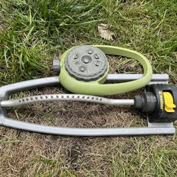 a Melnor multi-adjustable oscillating lawn sprinkler