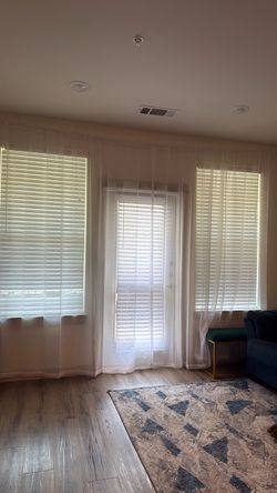 Curtain rod with curtains