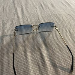 James Oro blue tint glasses