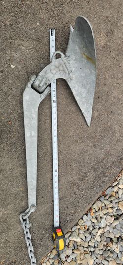 Galvanized plow style boat anchor with 27 foot chain.