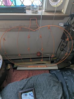 Metal pumpkin shaped photo display