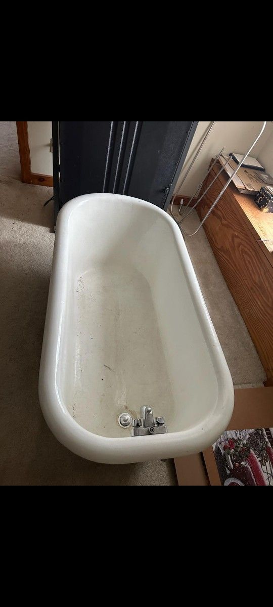 Antique Bathtub And Treadmill 