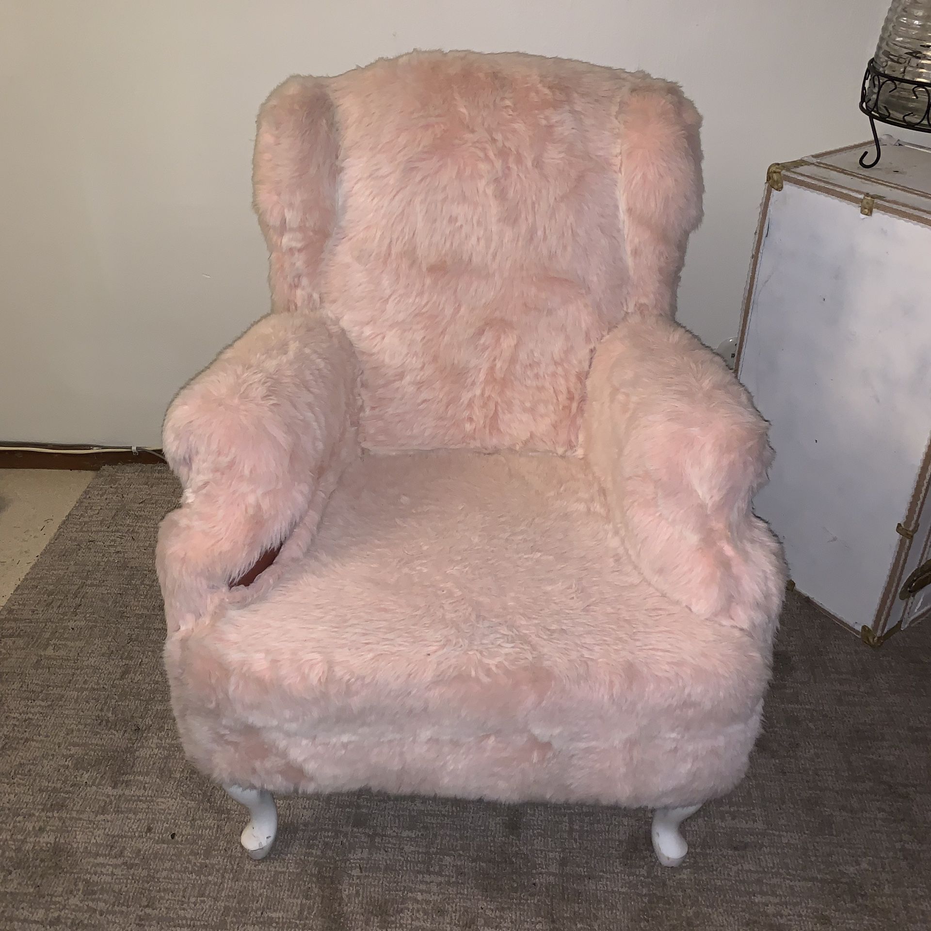 Pink fuzzy antique chair