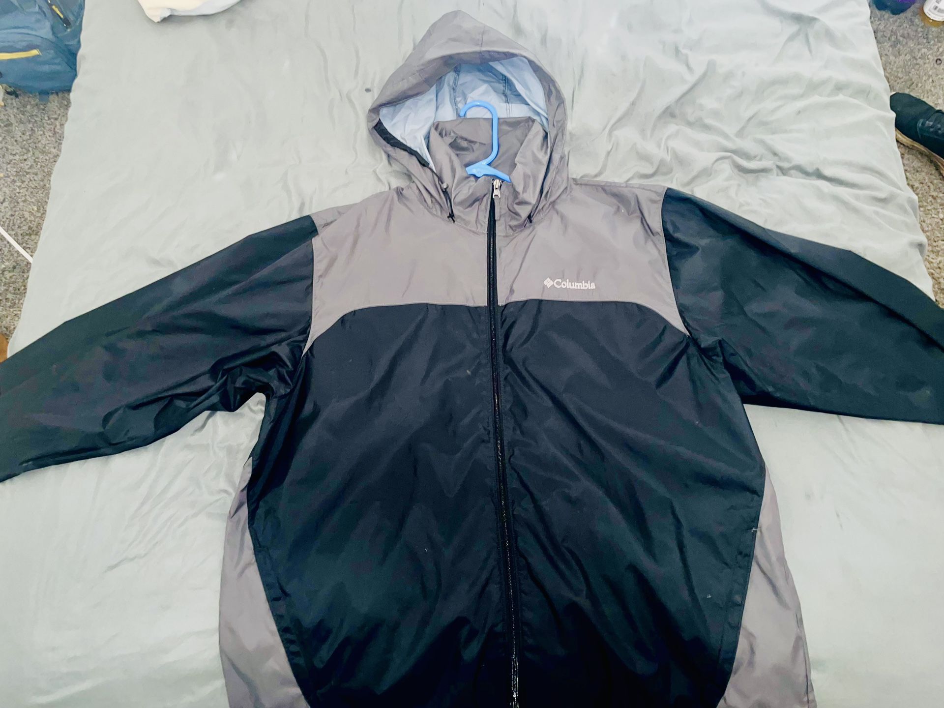 Columbia rain jacket with retractable hood.