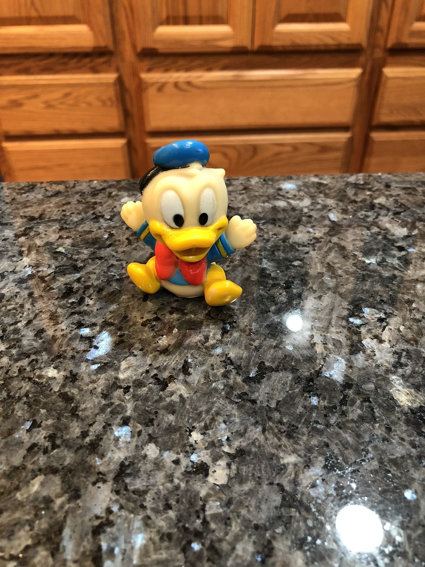 Vintage Very Old Disney Donald Duck Squeezeable Soft Vinyl / Rubber Figure. Size 2 1/2 inches Tall . Preowned . Has been on display in a cabinet wi