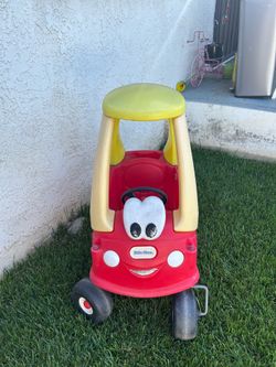 Toddlers push cart