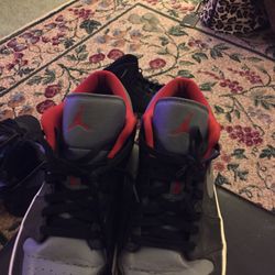 Nike Air Jordan’s Black/red/gray Low tops Size 13