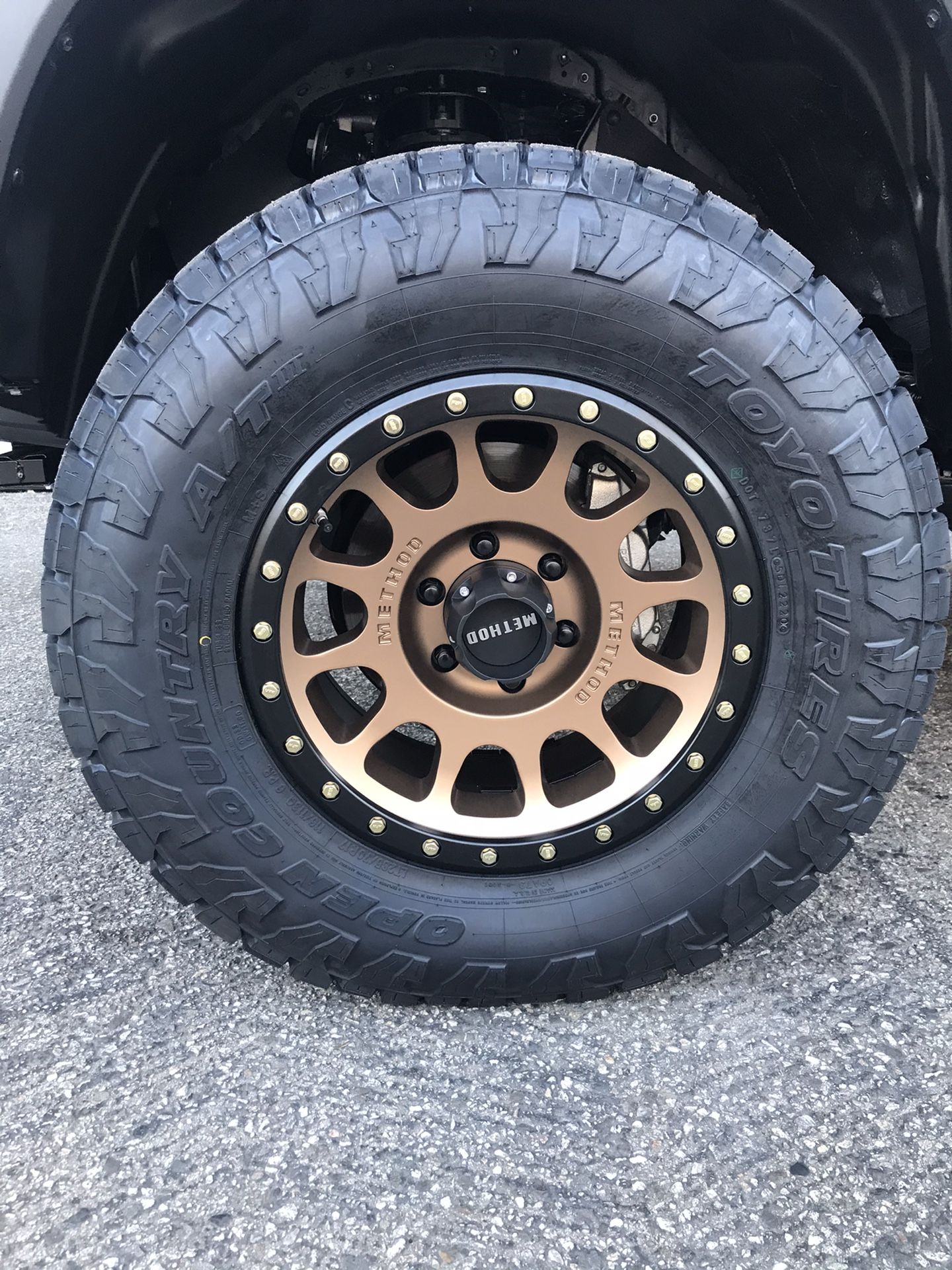 Method mr305 bronze nv wheels with TOYO open country at3 LT285/70/17 4runner Silverado