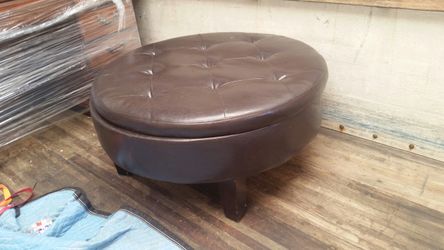 Round brown leather ottoman with mini storage
