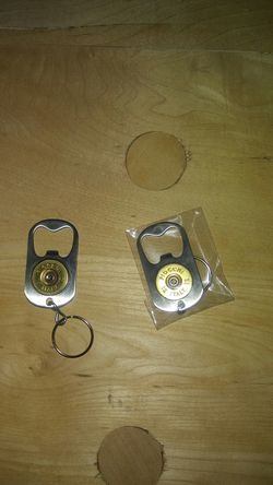 Shotgun shell bottle opener