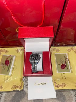 Iced out Cartier watch