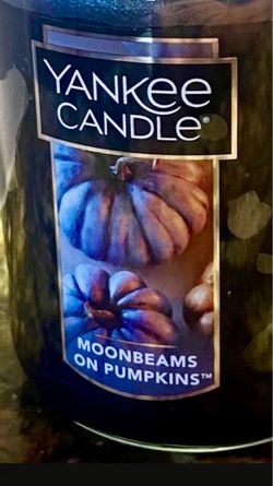 Large 22 ounce Yankee candle moonbeams on pumpkins