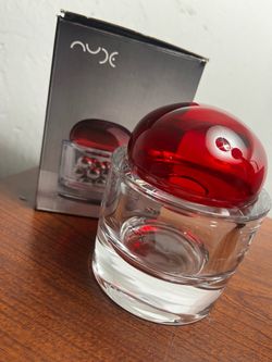 The selected item is the Nude Glass Ecrin Lidded Vessel (Small, Red) designed by Sebastian Herkner,