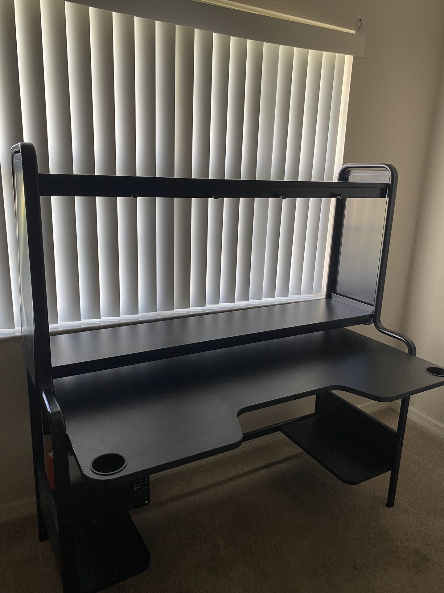 Desk with shelves and cup holders