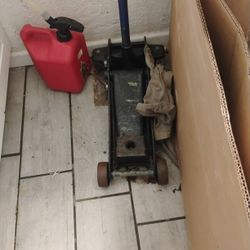 Floor Jack And Jumper Cables 