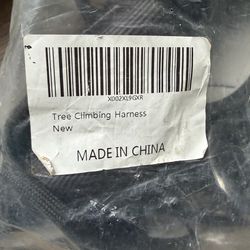 Tree climbing harness