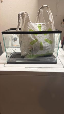 Small fish tank and pump with some decor