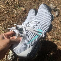 Nike Air VaporMax Flyknit 3 women's sneakers, specifically the "Tiffany Teal