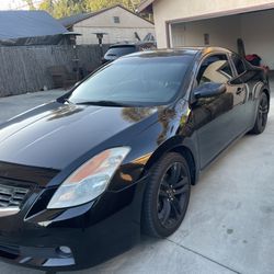 Black Nissan Altima Coupe 