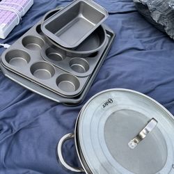 A Steamer Pot For Ur Veggies And A Set Of Baking Sheets With 6 Different Ones  