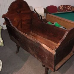 Hand carved solid wood antique cradle with matress and bedding