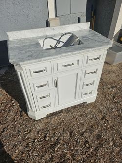 Bathroom vanity cabinet and top