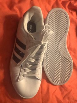 Woman’s Adidas, Size 7