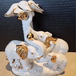 Porcelain Elephant Family Under Tree