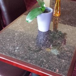 Granite table top with wood edging