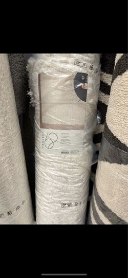 Used 7’1 x 10’ TAN woven shag rug