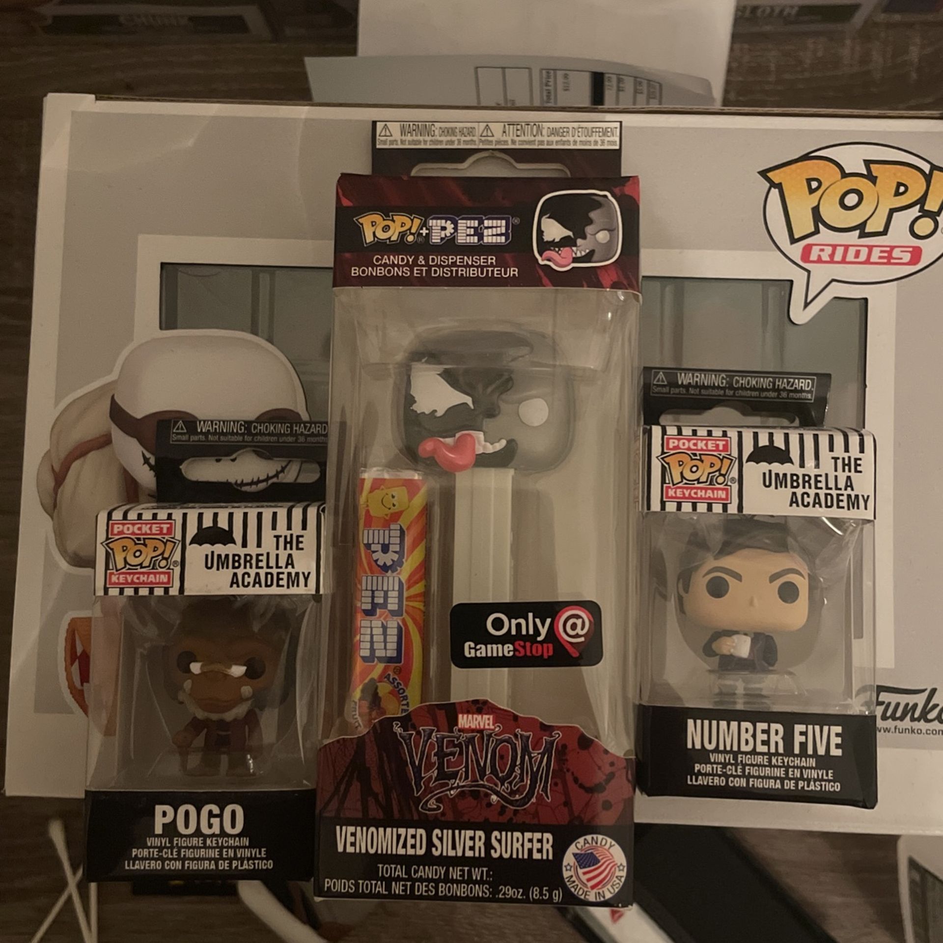 Two Funko  minis And came stop exclusive Venom pez