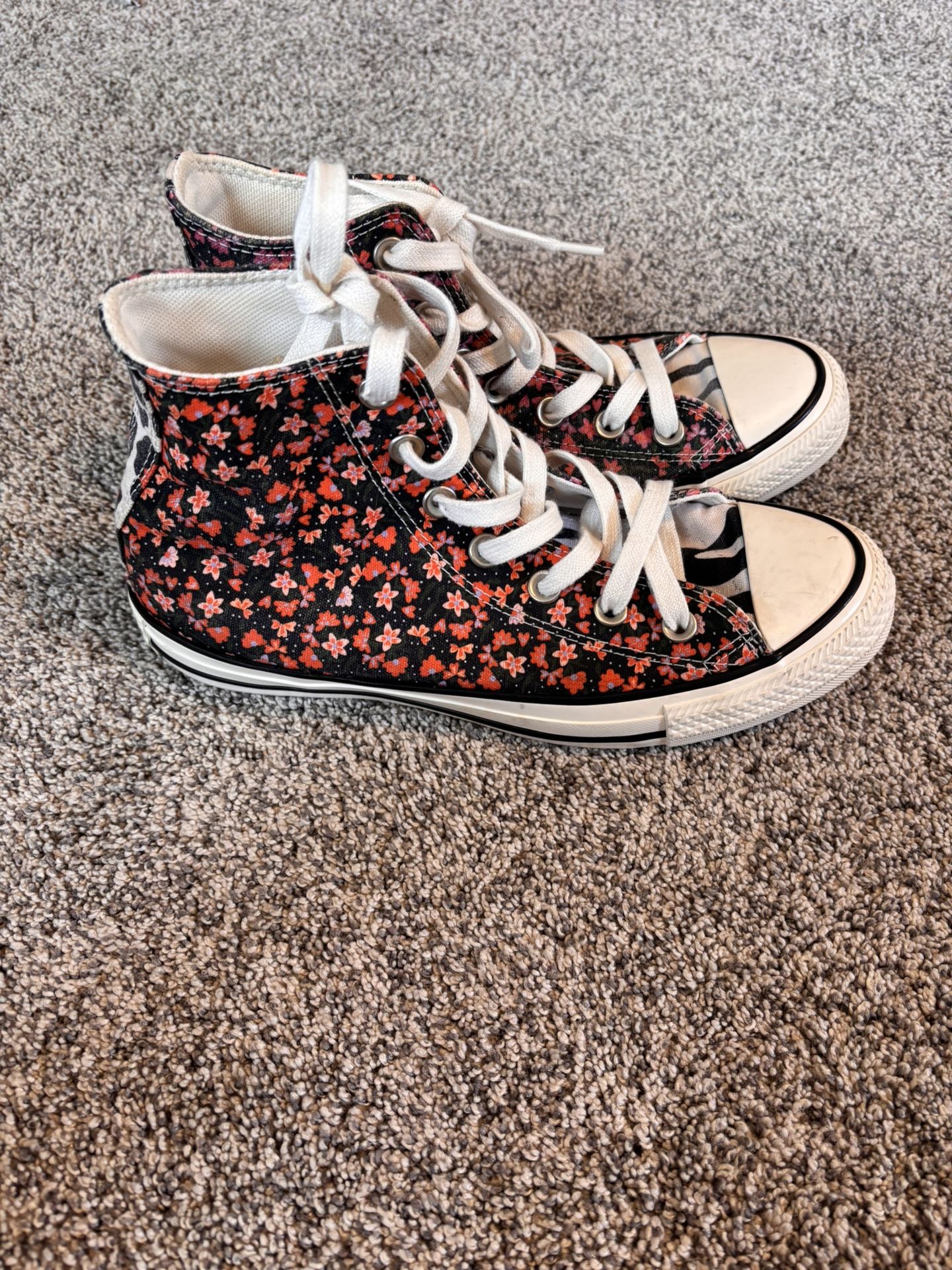 Converse Chuck Taylor All Star high-top sneakers with a floral and animal print