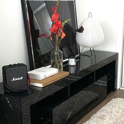 Credenza TV stand with faux black marble finish